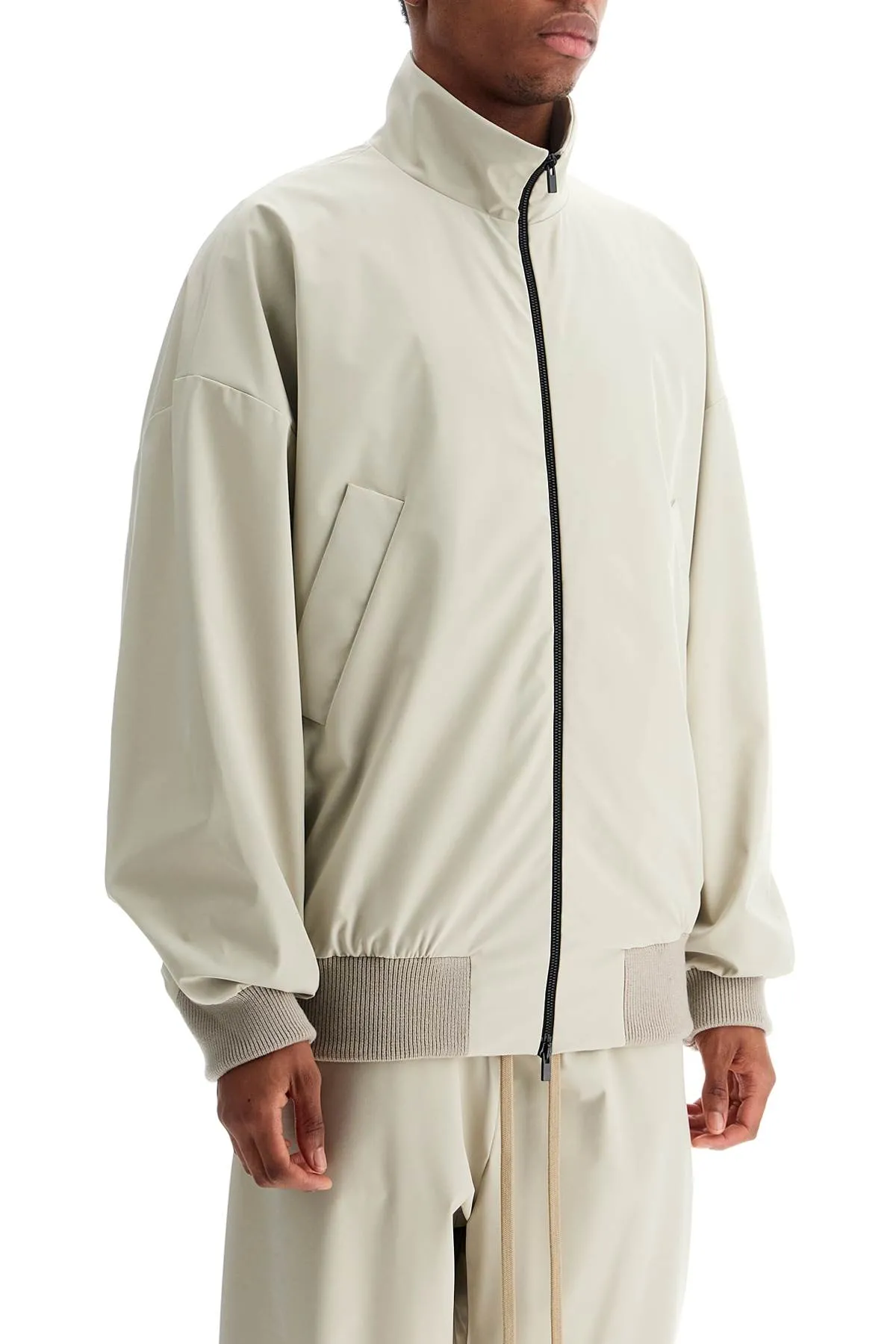 beige nylon and polyester jacket with high collar and zip